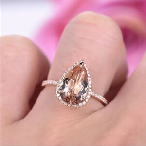 Rose Gold Pavé Halo Ring with Pear-Shaped Gemstone